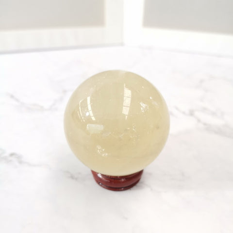 Round Gemstone with Wooden Base-Calcite