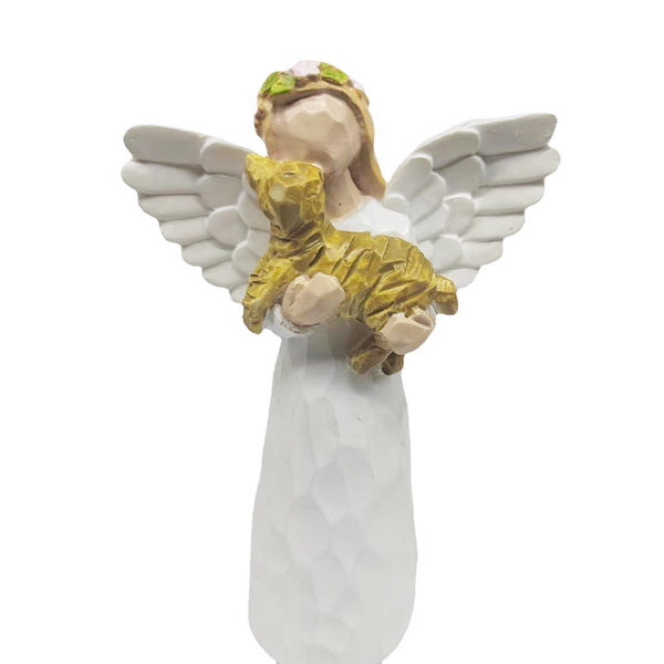 Angel Holding a Dog Figurine